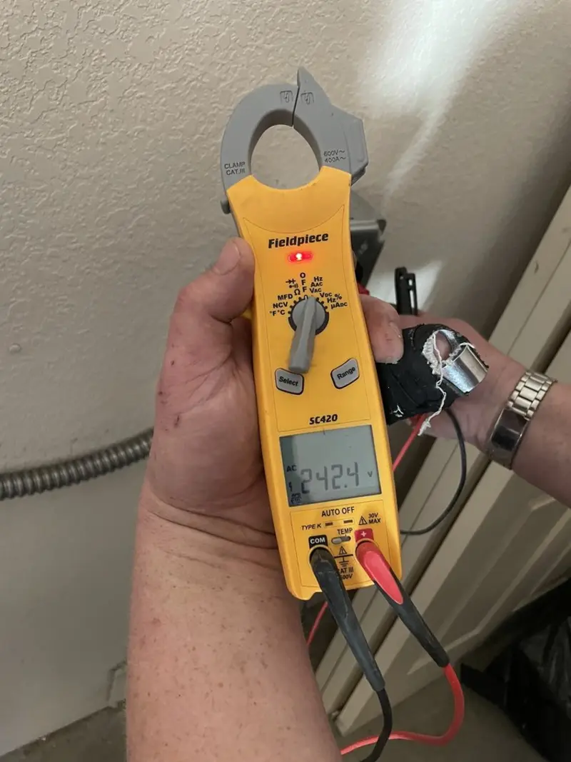 Voltage testing with clamp meter during Electrical Installation Services in Dripping Springs